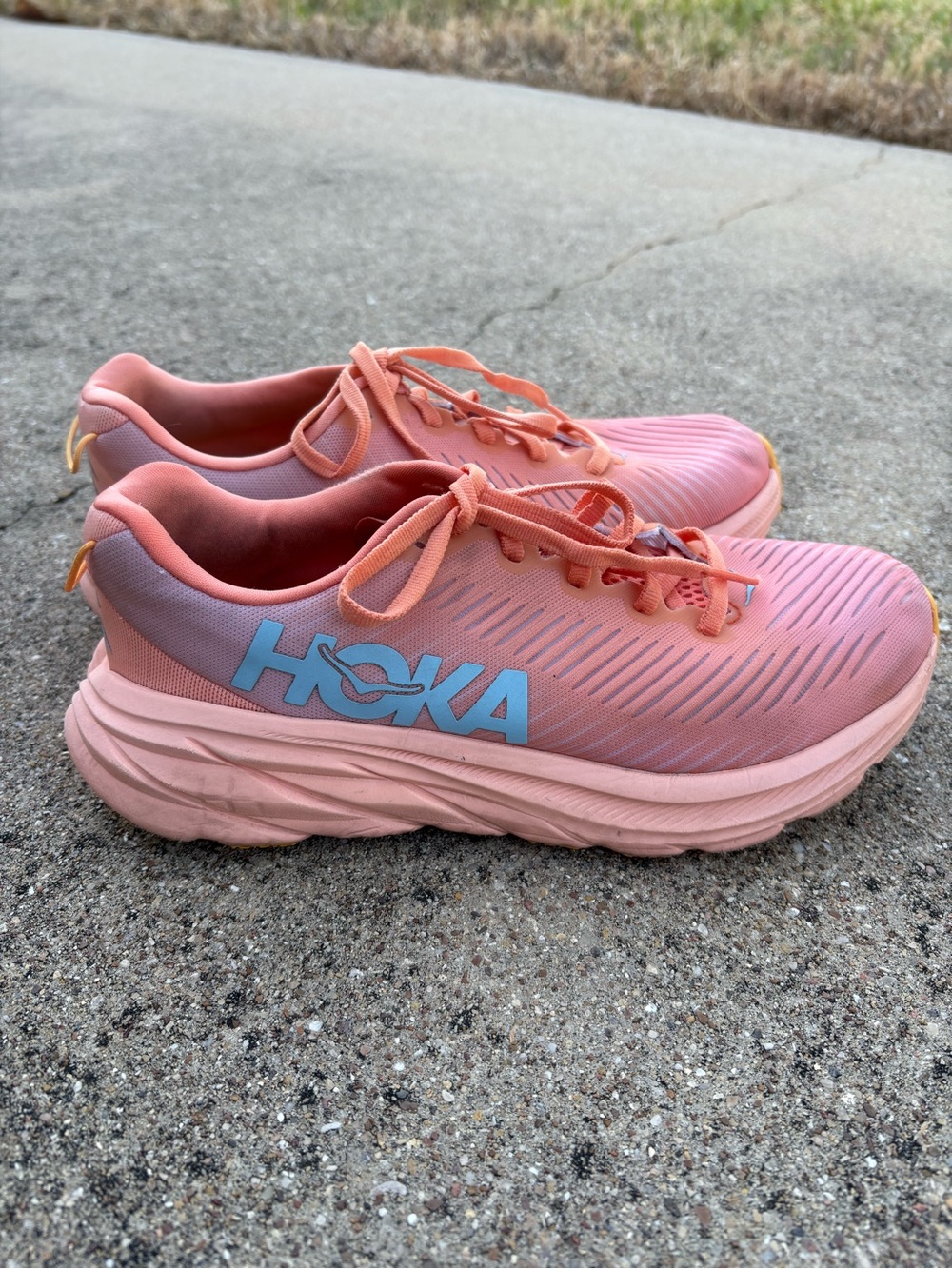 Hoka One One Pink Athletic Running Shoes with Light Blue Logo